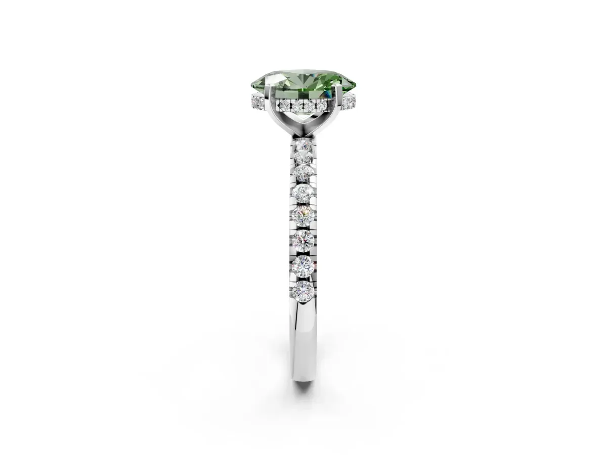 Fancy Green Oval Cut Diamond Solitaire Ring with Round Pavé Band and Four-Prong Setting Silver