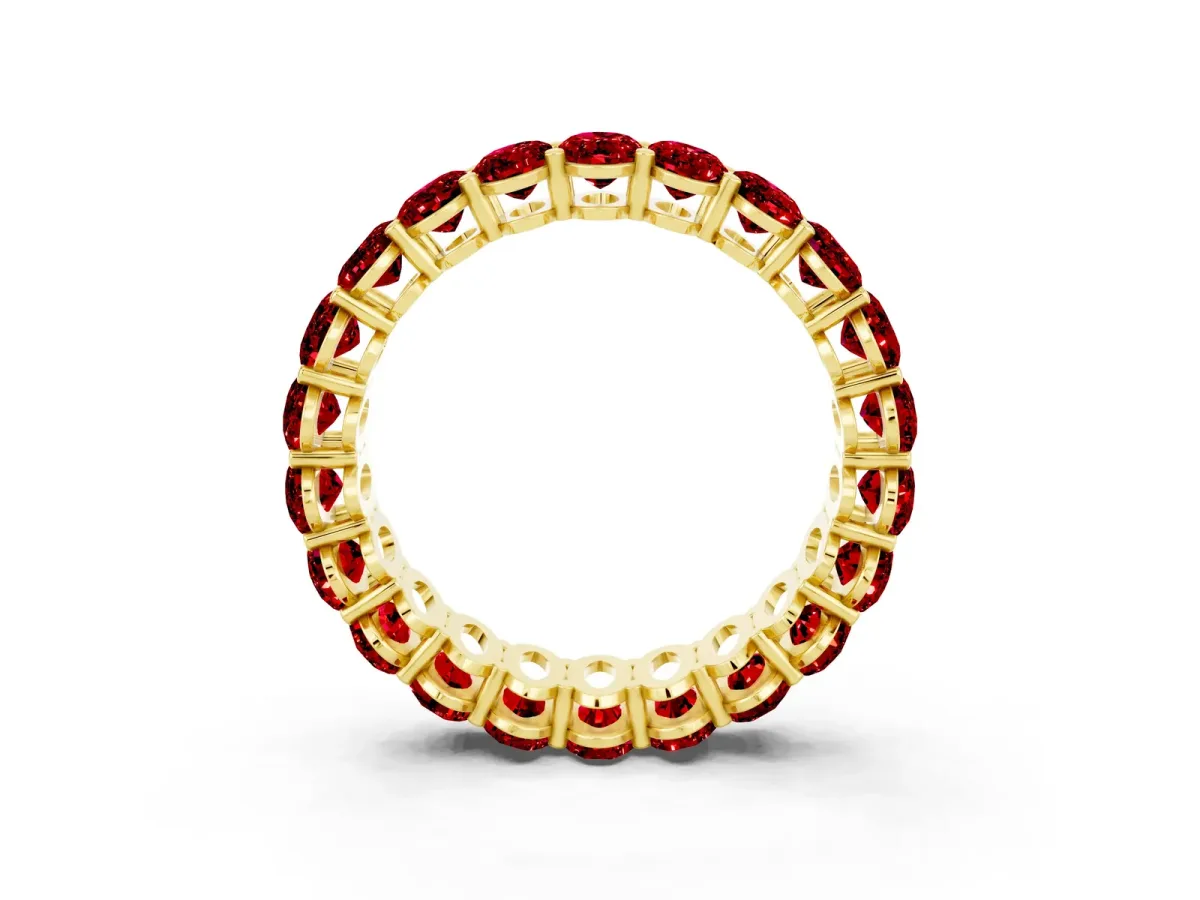 Oval Cut Ruby Eternity Band with Shared Prong Setting Yellow gold