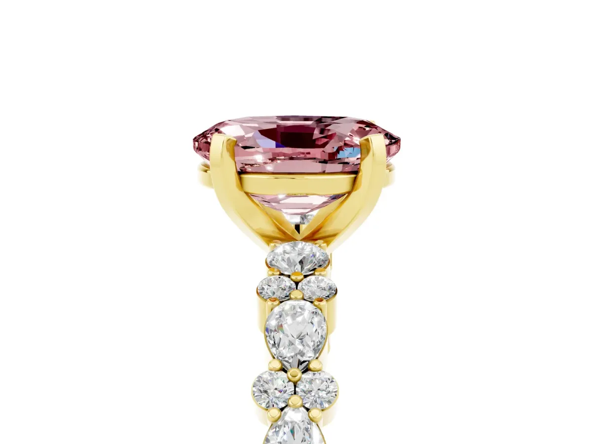 Oval Cut Morganite Side Stone Solitaire Ring with Round and Four-Prong Setting Yellow gold