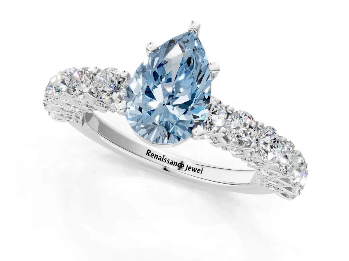 Fancy Blue Pear Cut Diamond Solitaire Ring with Shared Prong Pavé Band and Four-Prong Setting Silver
