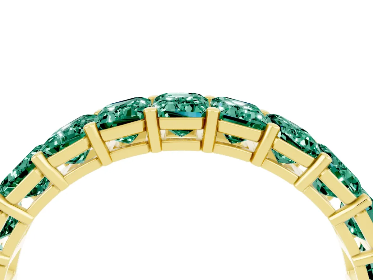 Emerald Cut Green Sapphire Eternity Band with Shared Prong Setting Yellow gold