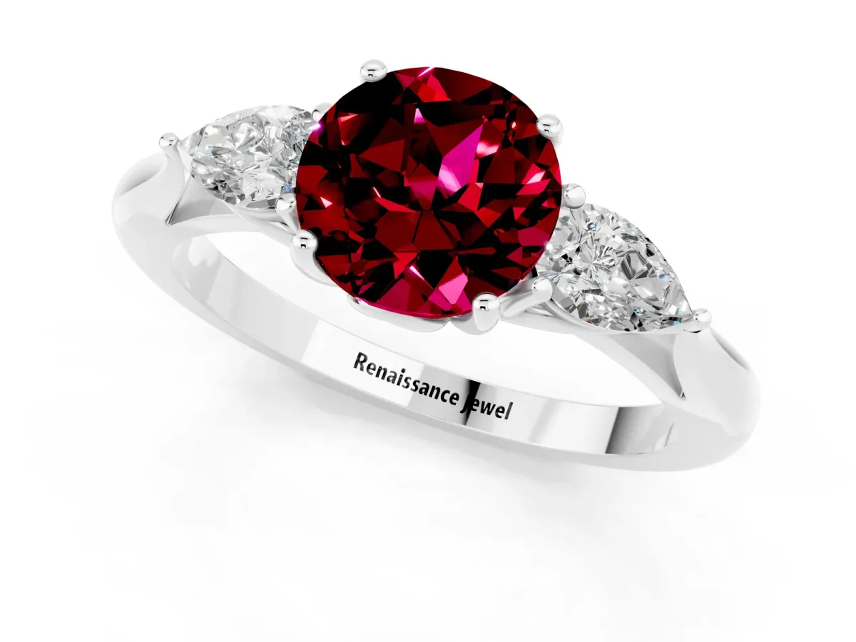 Three-Stone Round Cut Garnet Ring with Pear Side Stones in Four-Prong Setting Platinum