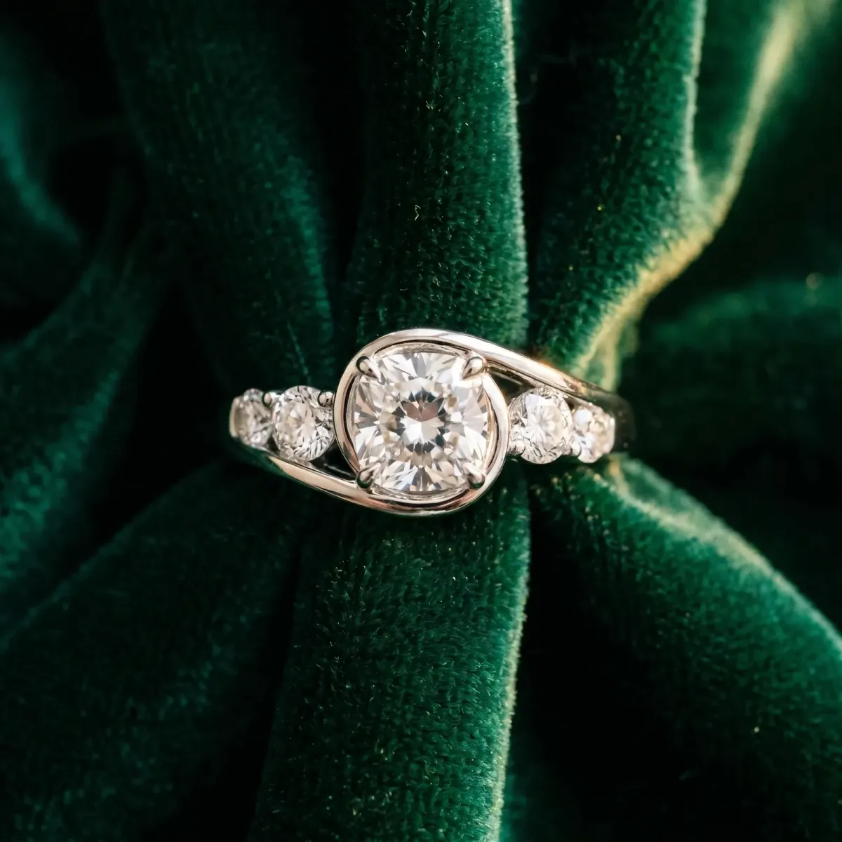 Bezel Set Cushion Cut Diamond Bypass Ring with Round Accents Platinum