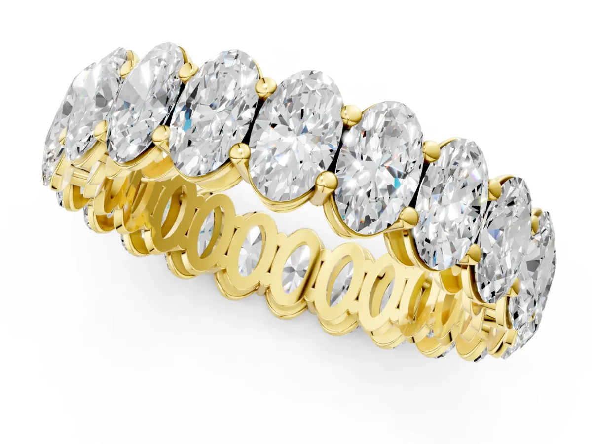 Oval Cut Diamond Eternity Band with Shared Prong Setting Yellow gold