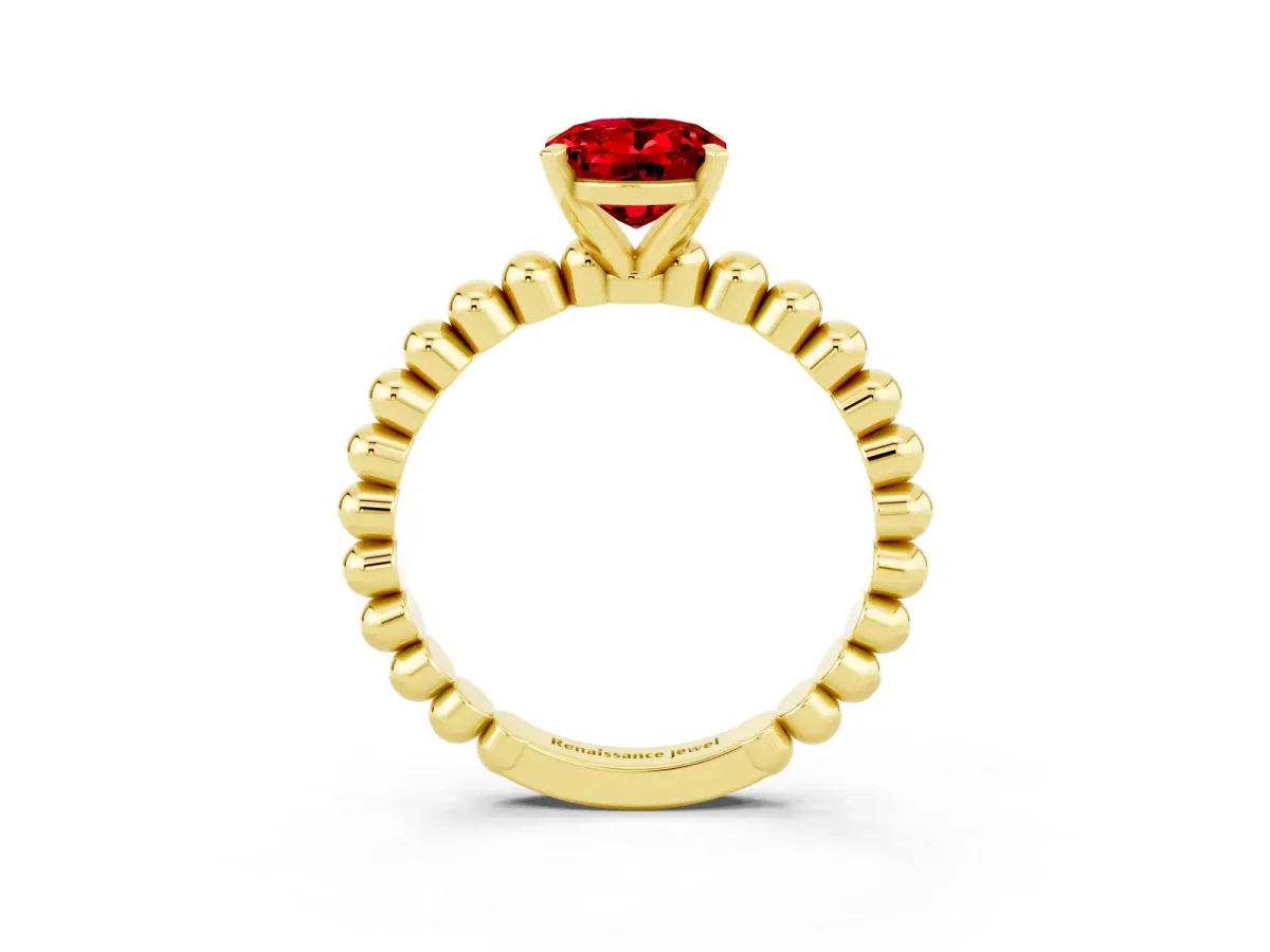 Oval Cut Ruby Solitaire Ring with Beaded Band and Prong Setting Yellow gold