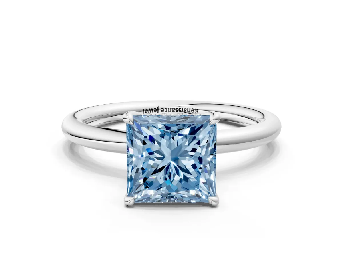 Fancy Blue Princess Cut Diamond Solitaire Ring with Thin Band and Four-Prong Setting White gold