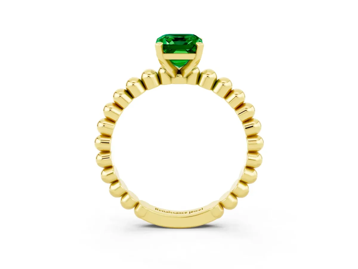 Emerald Cut Emerald Solitaire Ring with Beaded Band and Prong Setting Yellow gold