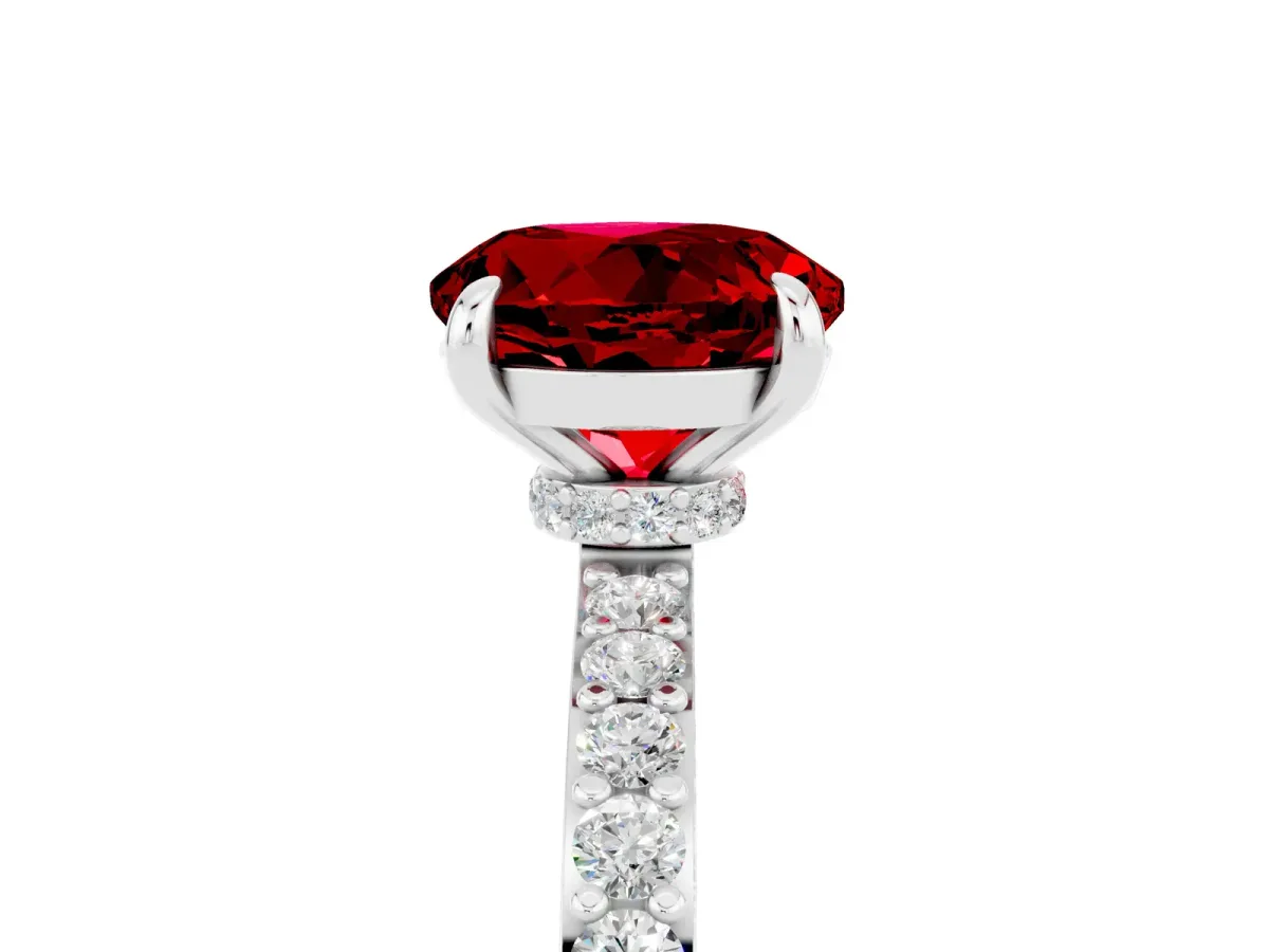 Round Cut Ruby Solitaire Engagement Ring with Pavé Band and Four-Prong Setting Silver