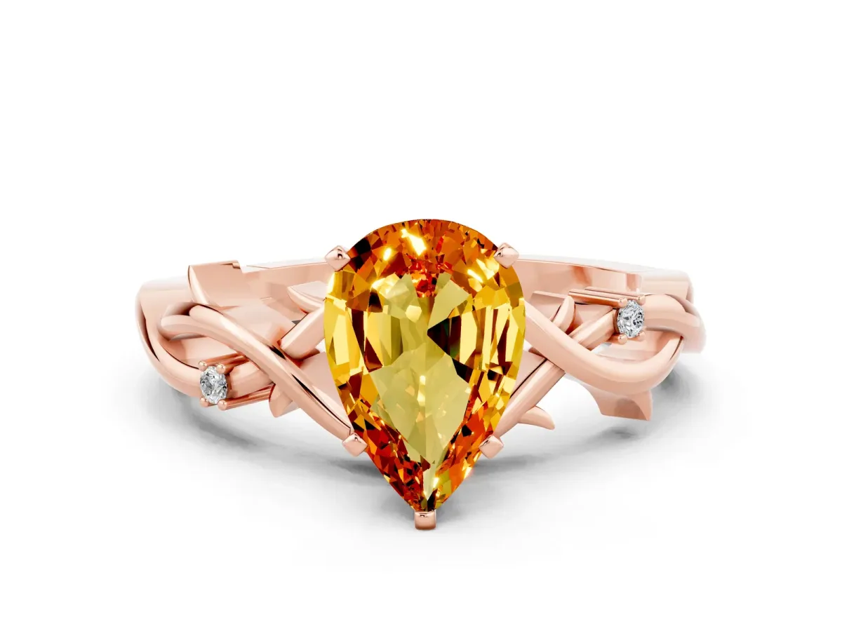Pear Cut Citrine Solitaire Ring with Twisted Band and Prong Setting Rose gold