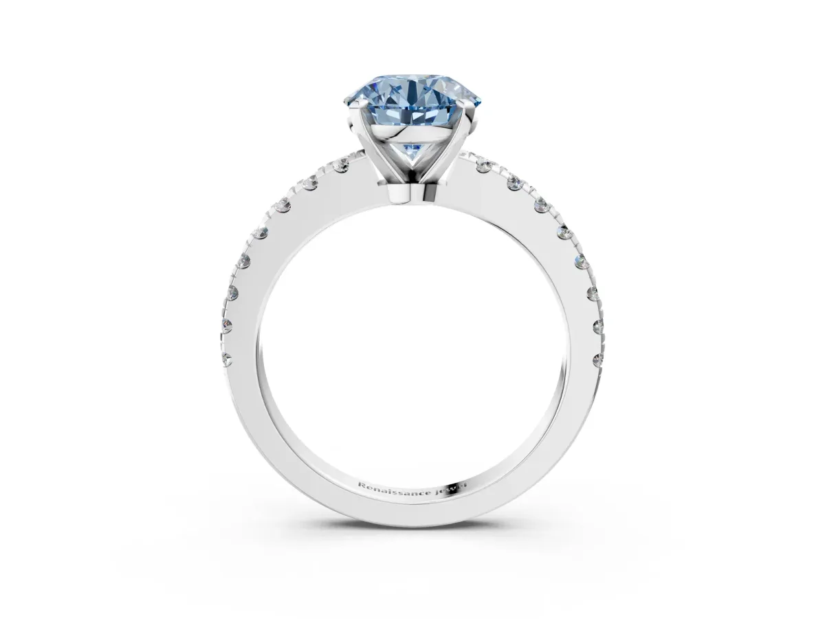 Fancy Blue Round Cut Solitaire Diamond with Pavé Band and Four-Prong Setting Silver