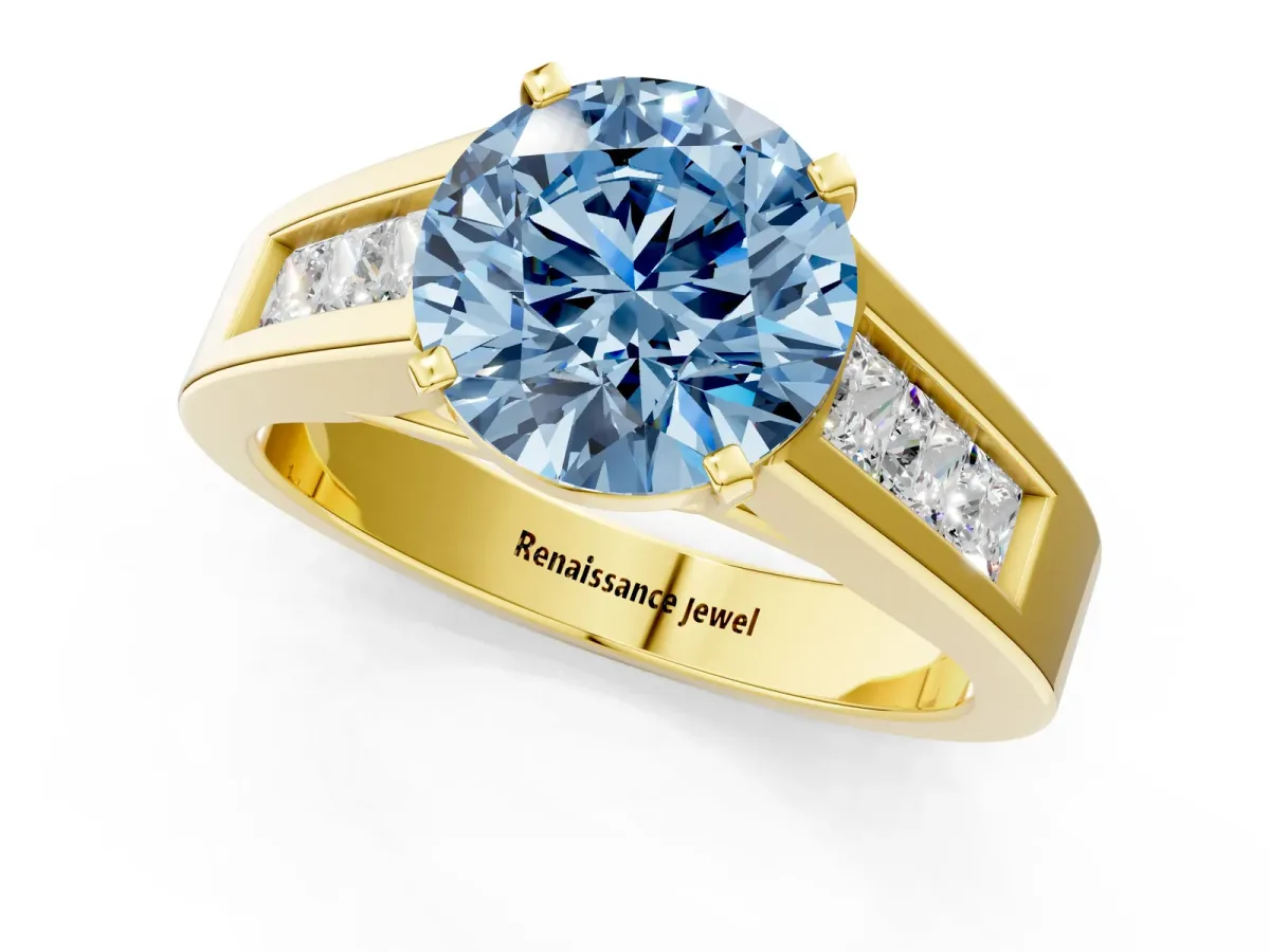 Fancy Blue Round Cut Cut Channel Set Solitaire Ring with Four-Prong Setting Yellow gold