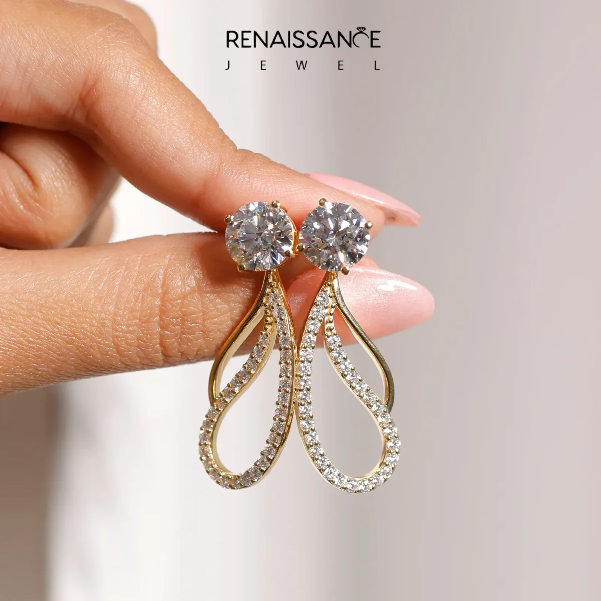 Round Cut Prong Set Diamond Infinity Drop Earrings Yellow gold