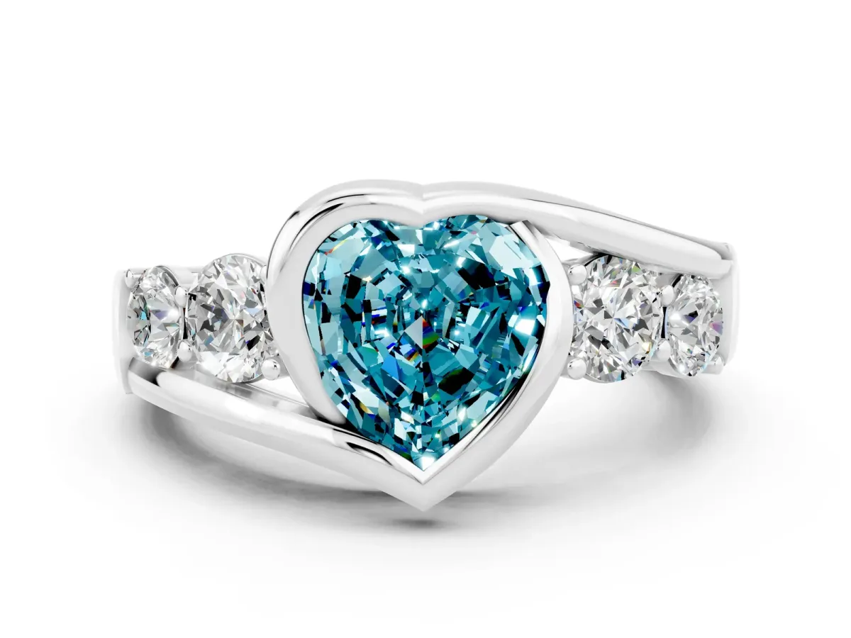 Bezel Set Heart Cut Blue Topaz Bypass Ring with Round Accents Silver