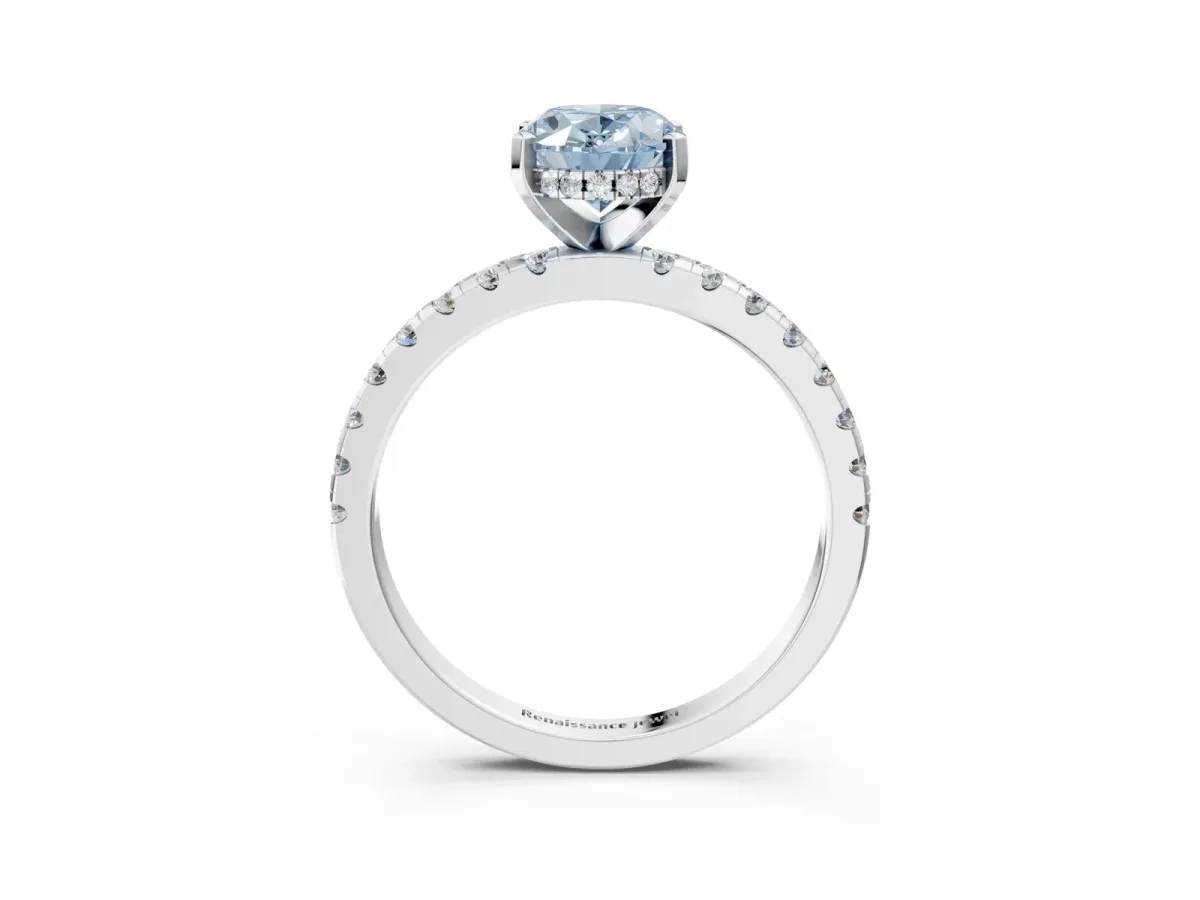Fancy Blue Oval Cut Diamond Solitaire Ring with Round Pavé Band and Four-Prong Setting Silver