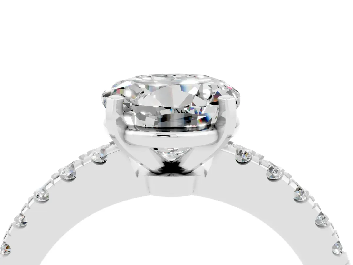 Round Cut Solitaire Moissanite with Pavé Band and Four-Prong Setting Silver