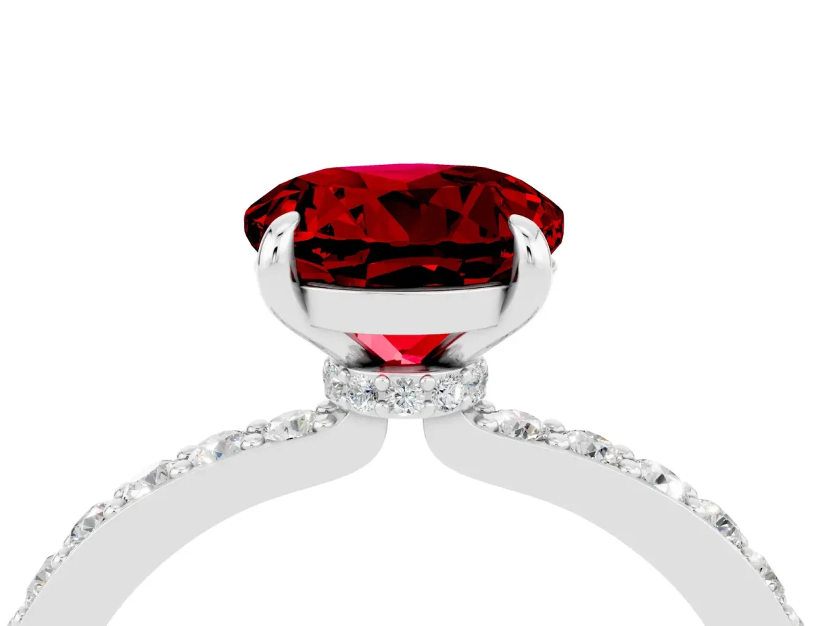 Round Cut Ruby Solitaire Engagement Ring with Pavé Band and Four-Prong Setting Silver