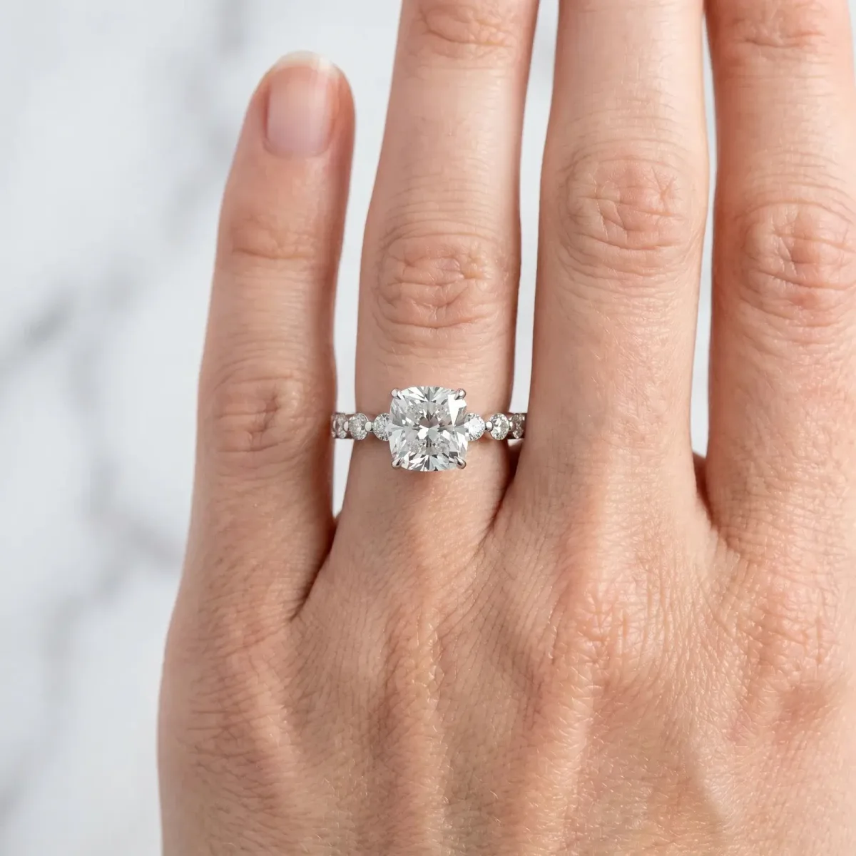 Cushion Cut Solitaire Diamond Ring with Pave Band and Four-Prong Setting Silver