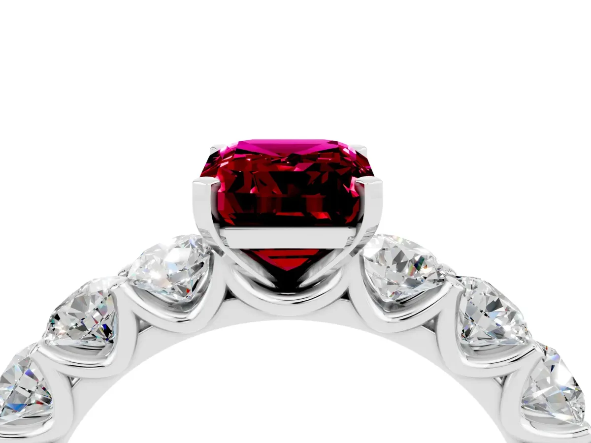 Emerald Cut Garnet Prong Setting with Side Stones on a Pave Band Platinum