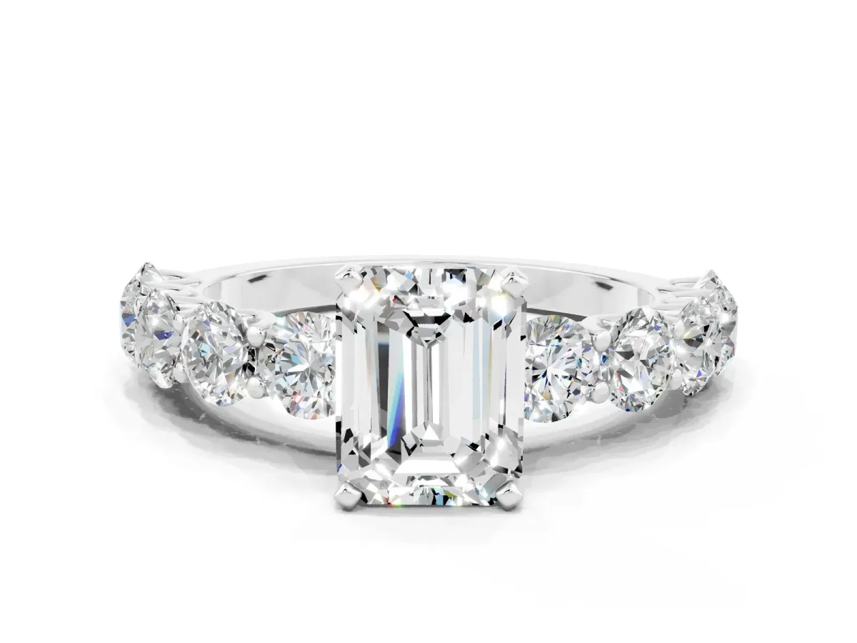 Emerald Cut Moissanite Prong Setting with Side Stones on a Pave Band Platinum