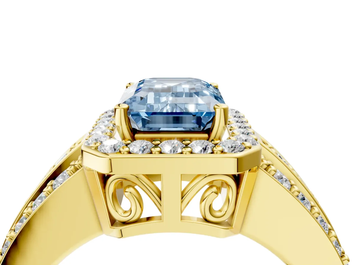 Fancy Blue Emerald Cut Halo Diamond Ring with Round Split Shank and Prong Setting Yellow gold