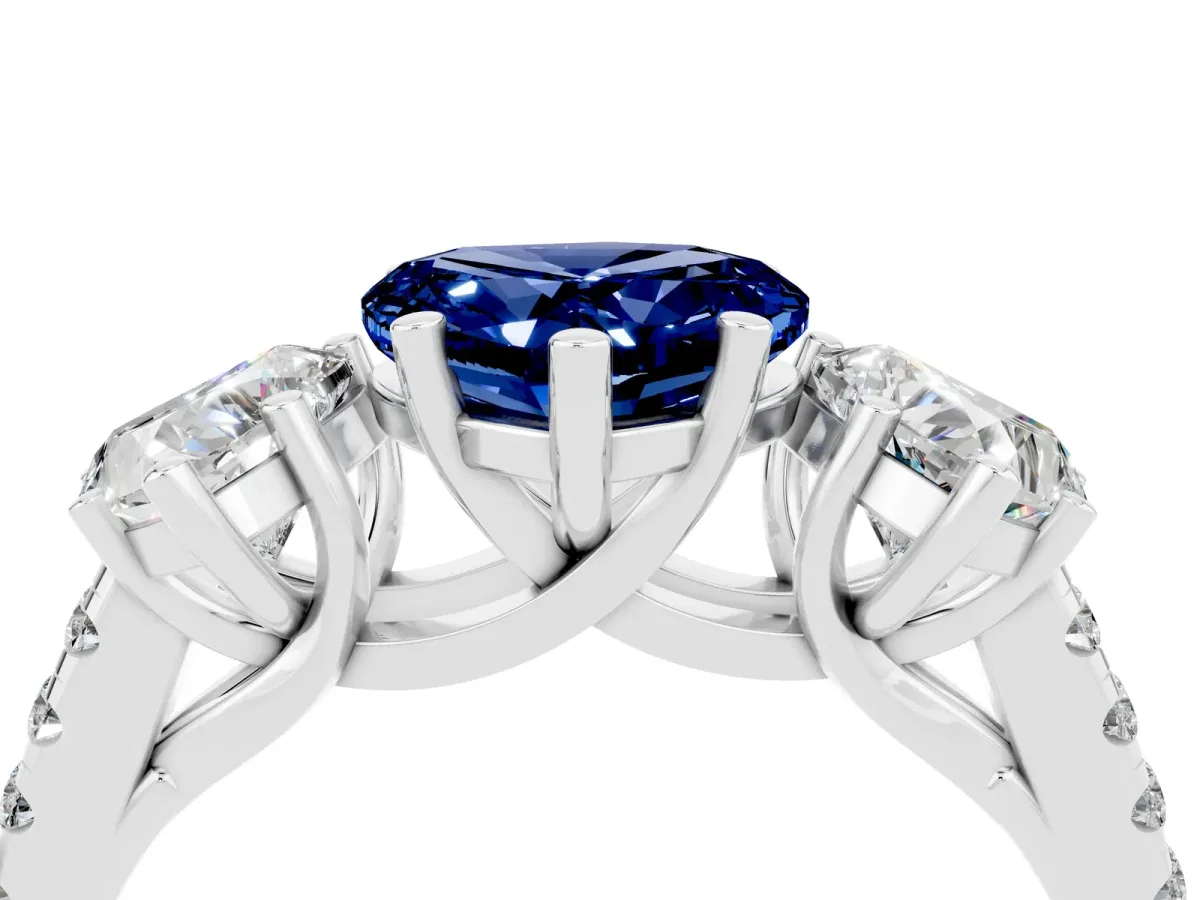Three-Stone Heart Cut Blue Sapphire Ring with Round Pavé Band and Prong Setting Silver