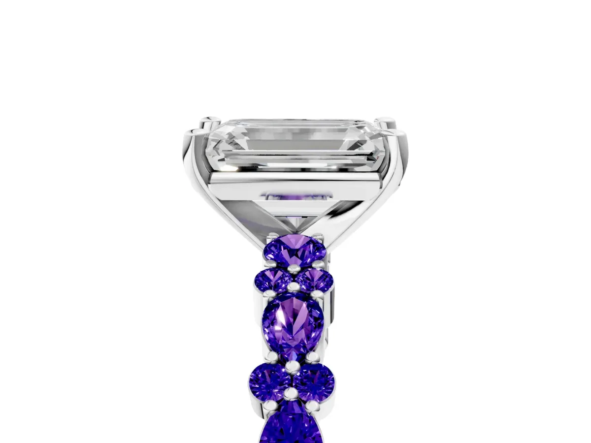Emerald Cut Diamond Side Stone Solitaire Ring with Round Tanzanite and Four-Prong Setting Platinum