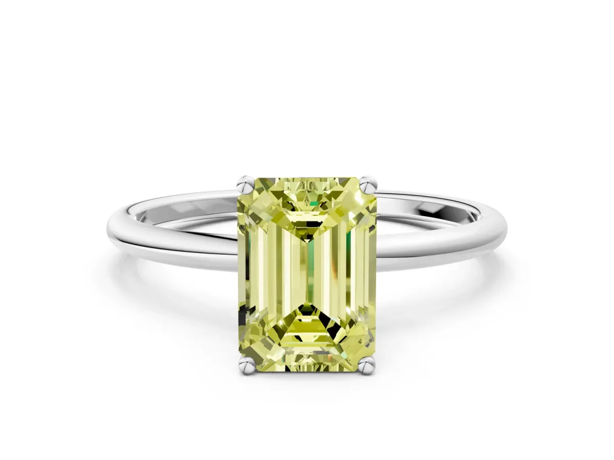 Fancy Yellow Emerald Cut Cut Solitaire Engagement Ring with Thin Band and Four-Prong Setting Silver