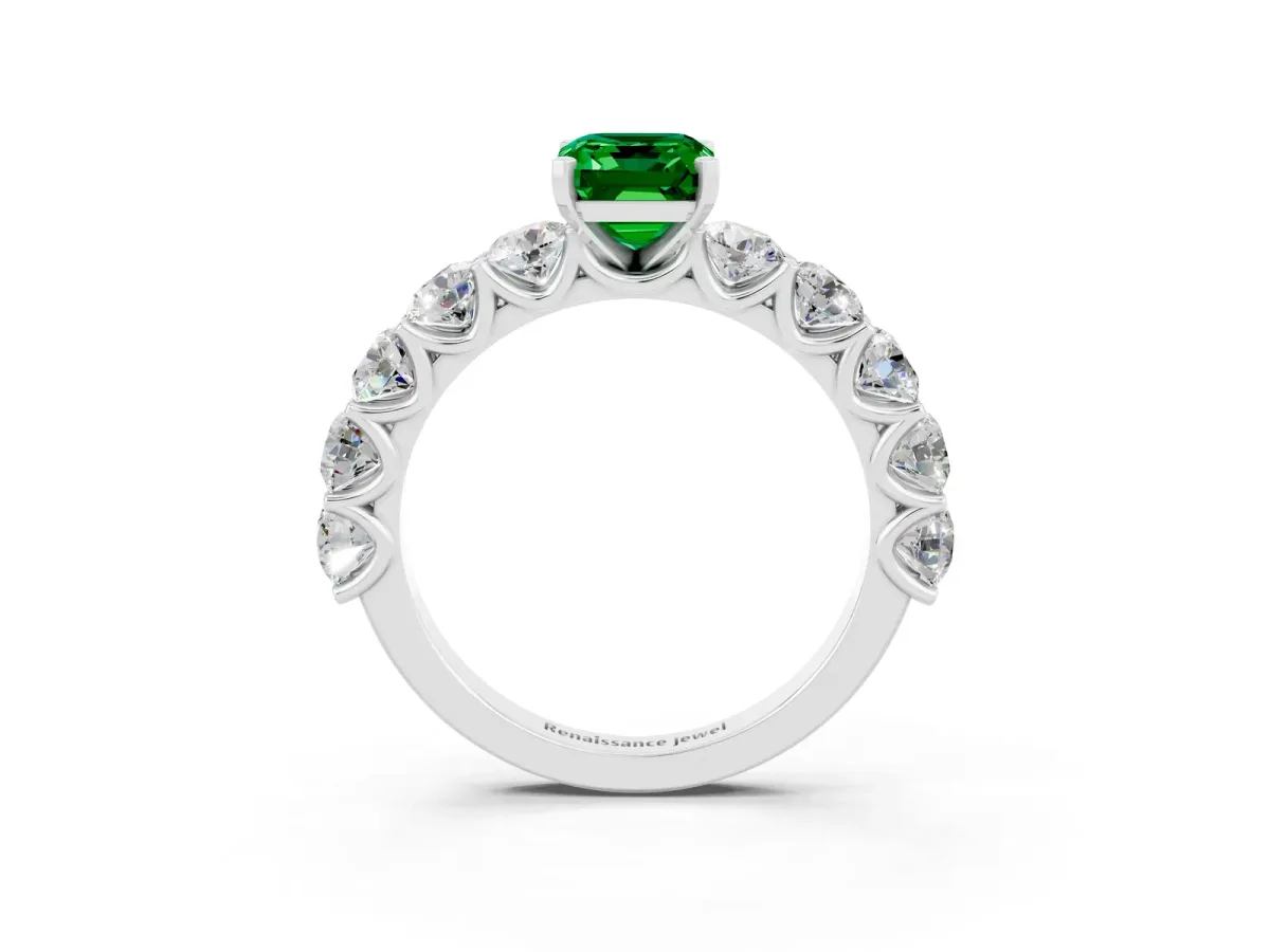 Emerald Cut Emerald Prong Setting with Side Stones on a Pave Band Platinum