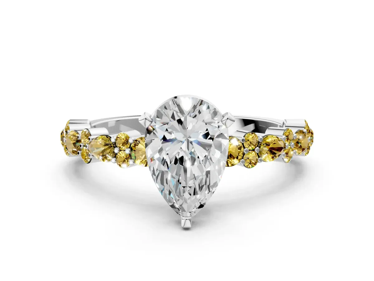 Pear Cut Diamond Side Stone Solitaire Ring with Round Yellow Sapphire and Four-Prong Setting Silver
