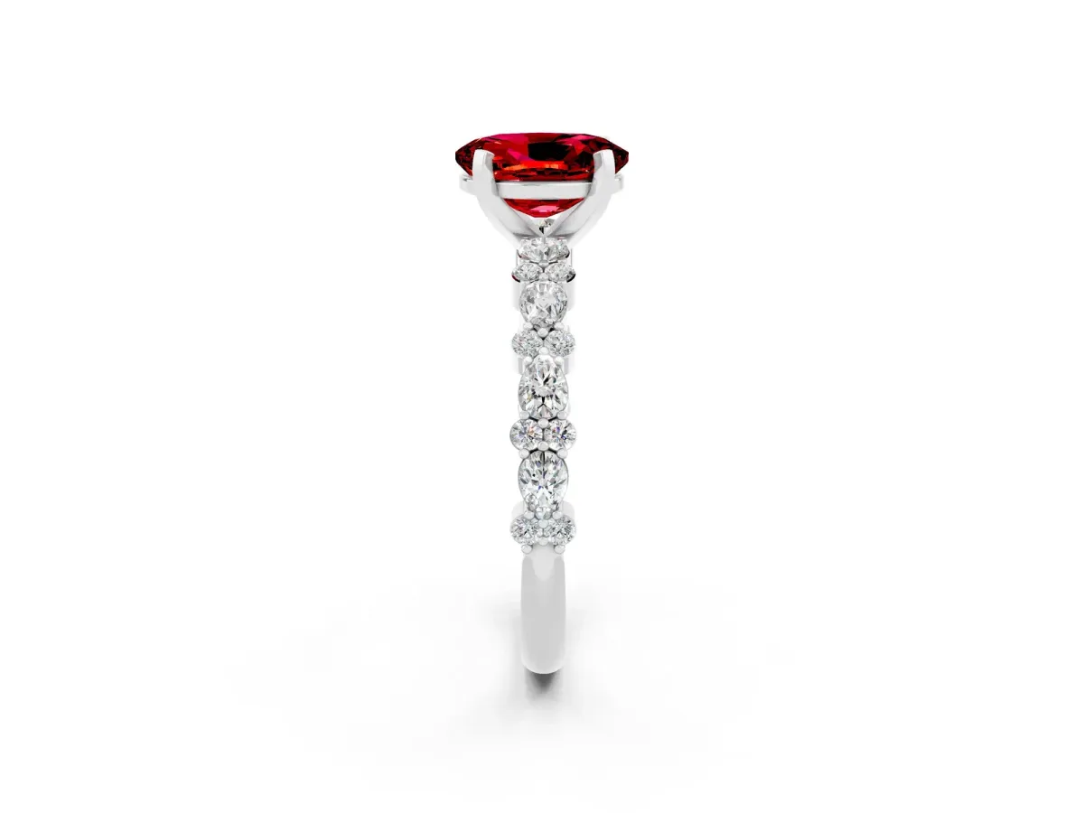 Oval Cut Ruby Side Stone Solitaire Ring with Round and Four-Prong Setting Platinum