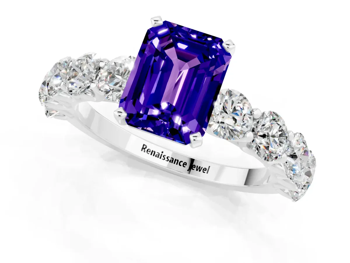 Emerald Cut Tanzanite Prong Setting with Side Stones on a Pave Band Silver