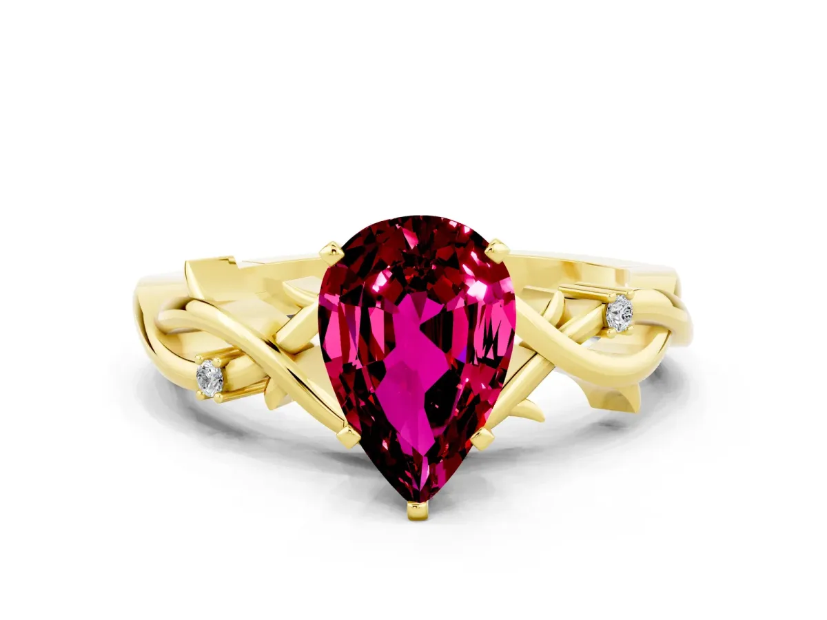 Pear Cut Garnet Solitaire Ring with Twisted Band and Prong Setting Yellow gold