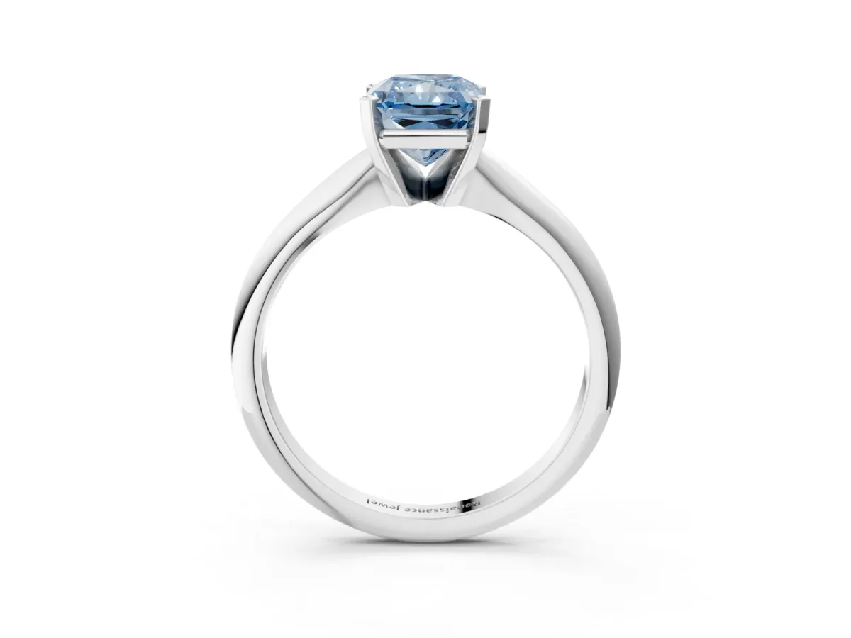 Fancy Blue Radiant Cut Cut Solitaire Ring with Four-Prong Setting on a Classic Band Platinum