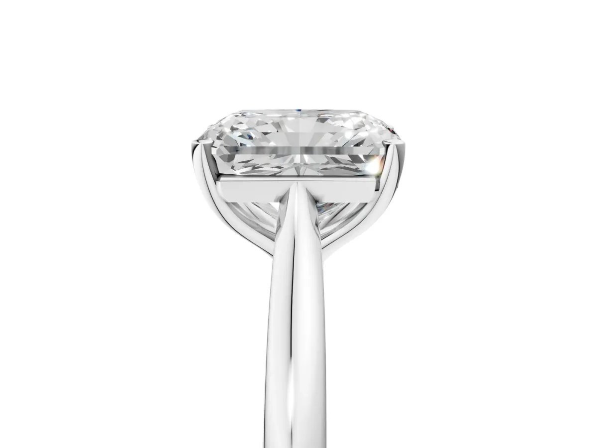 Radiant Cut Cut Solitaire Ring with Cathedral Band and Four-Prong Setting Platinum