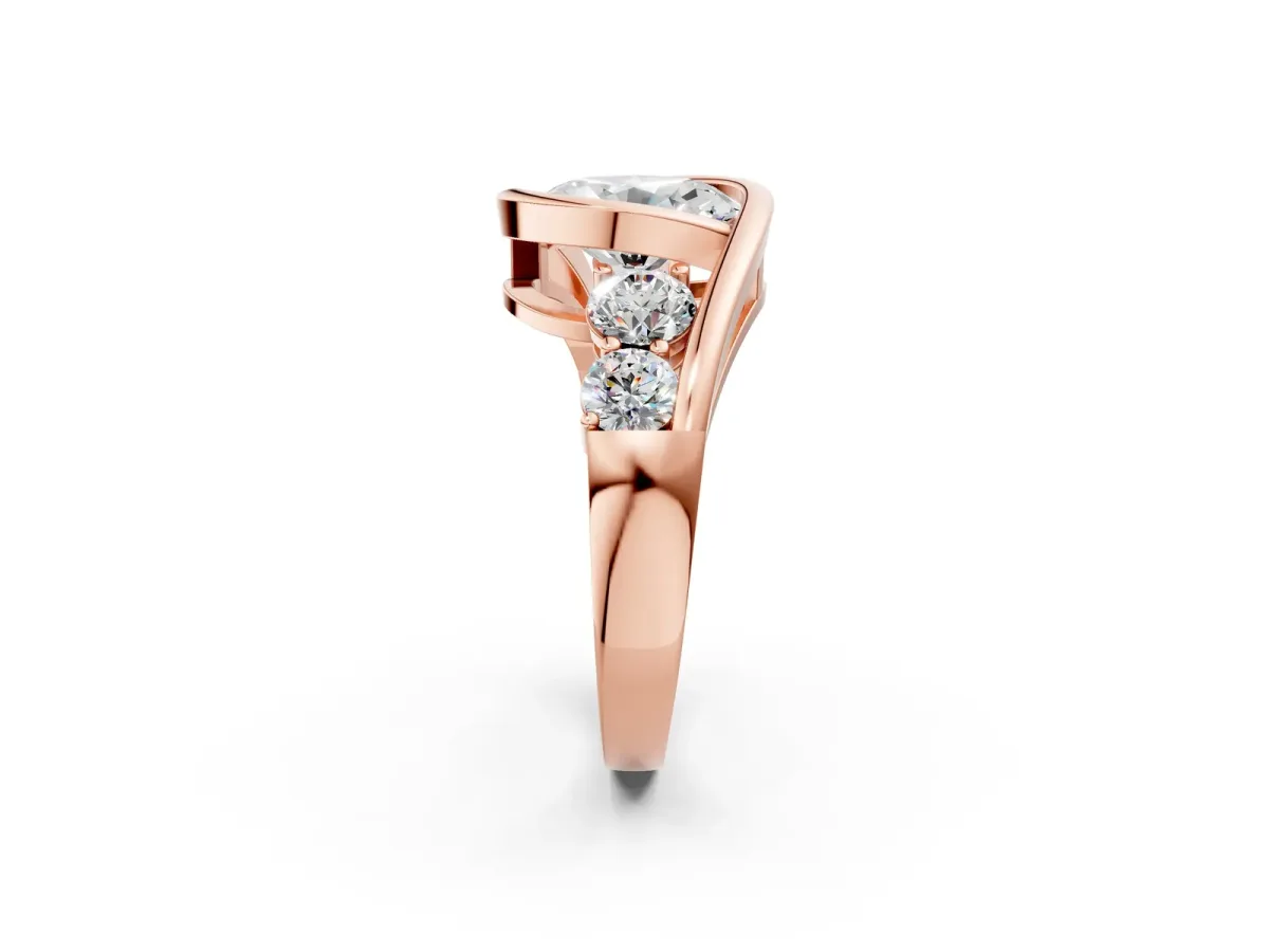 Bezel Set Oval Cut Diamond Bypass Ring with Round Accents Rose gold