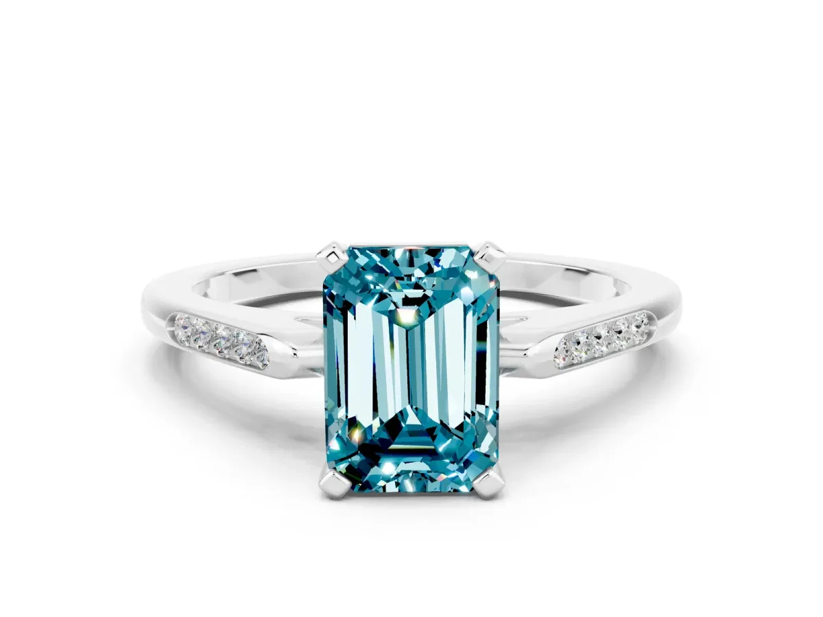 Emerald Cut Blue Topaz Solitaire Ring with Channel Set Round Band and Prong Setting Silver