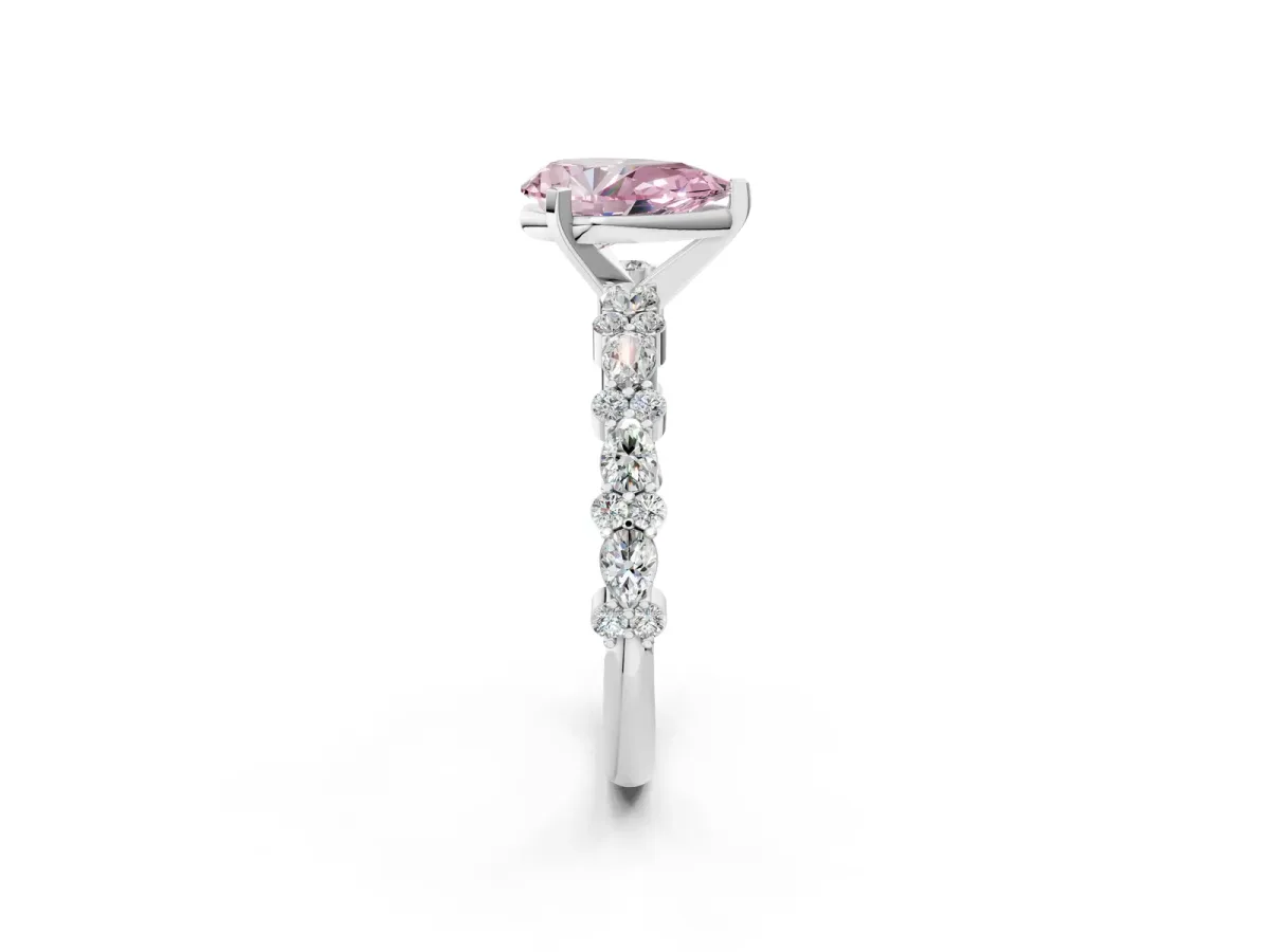 Fancy Pink Pear Cut Diamond Side Stone Solitaire Ring with Round and Four-Prong Setting White gold
