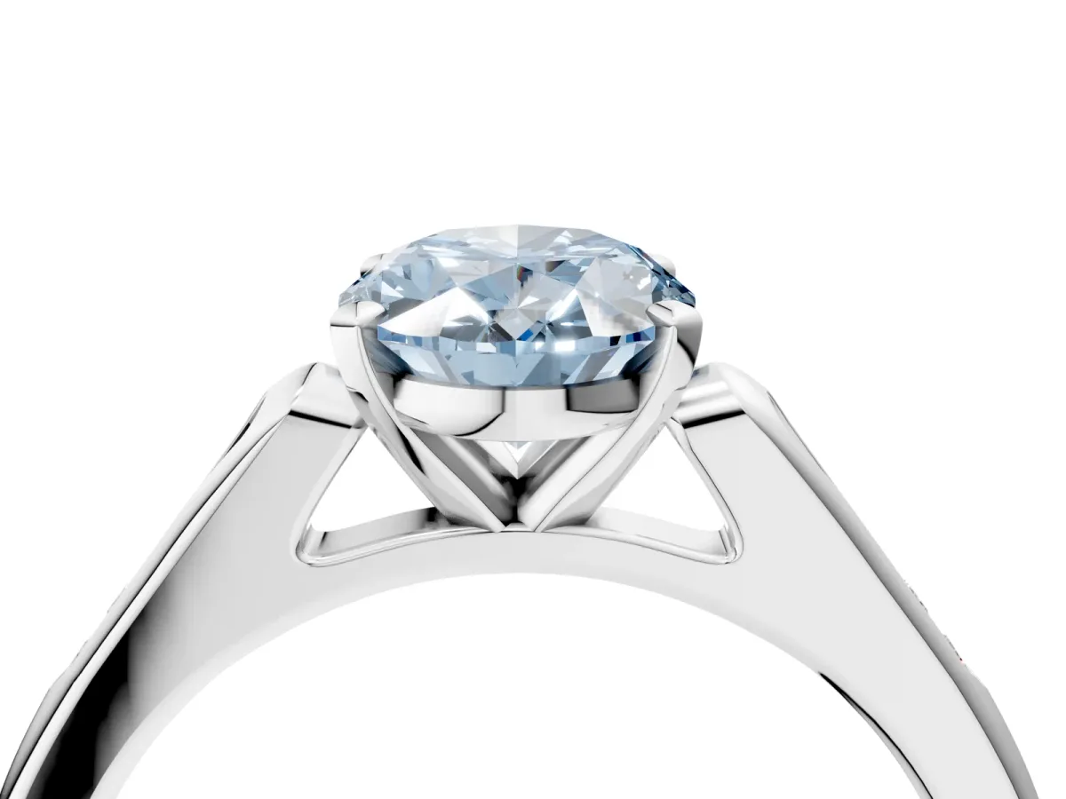 Fancy Blue Oval Cut Diamond Solitaire Ring with Channel Set Round Band and Prong Setting Silver