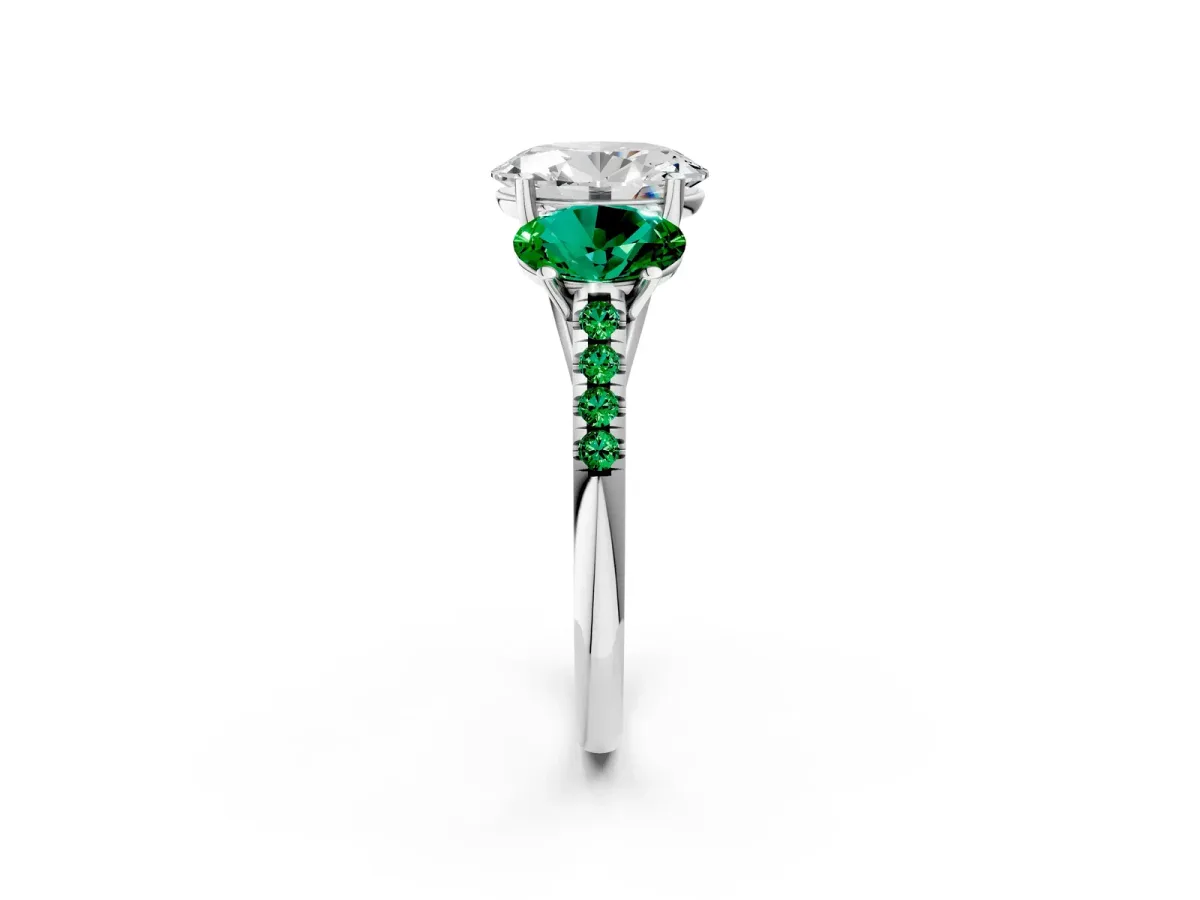Three-Stone Oval Cut Diamond Ring with Round Emerald Pavé Band and Prong Setting Silver
