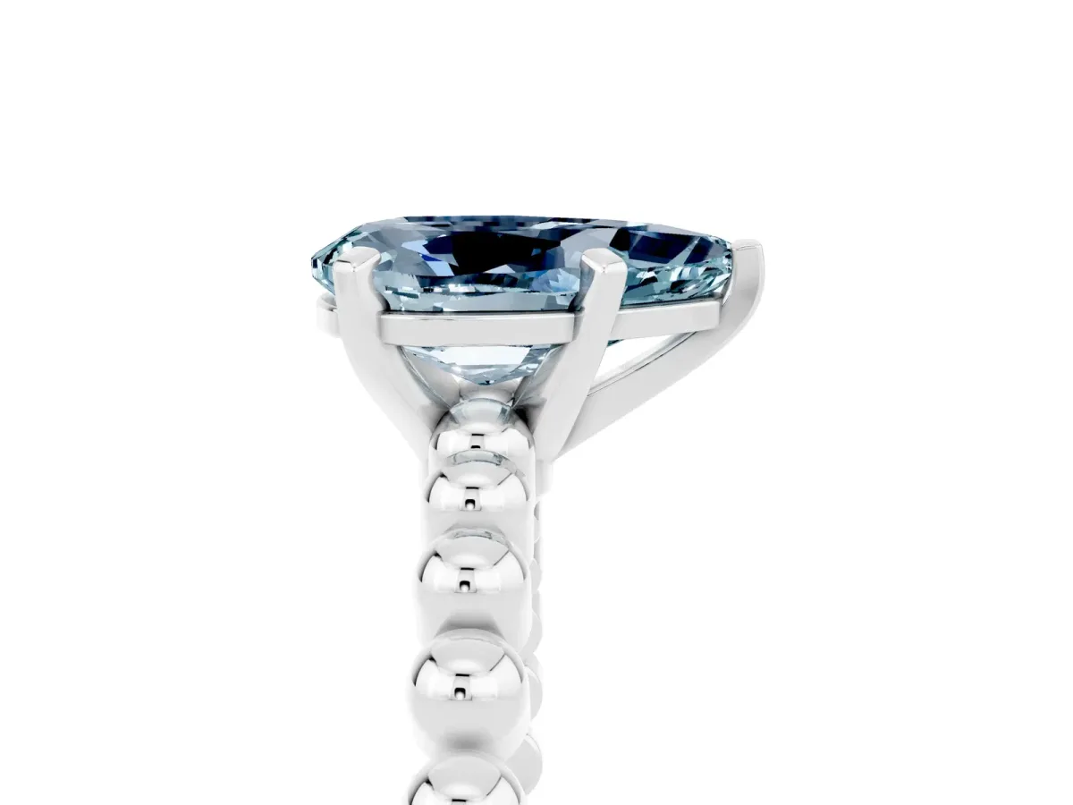 Pear Cut Aquamarine Solitaire Ring with Beaded Band and Prong Setting Silver