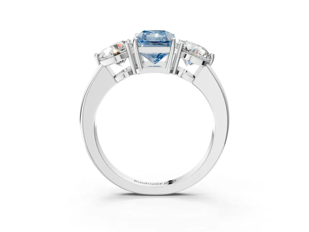 Fancy Blue Radiant Cut Diamond Three-Stone Ring with Prong Setting and Classic Band Platinum