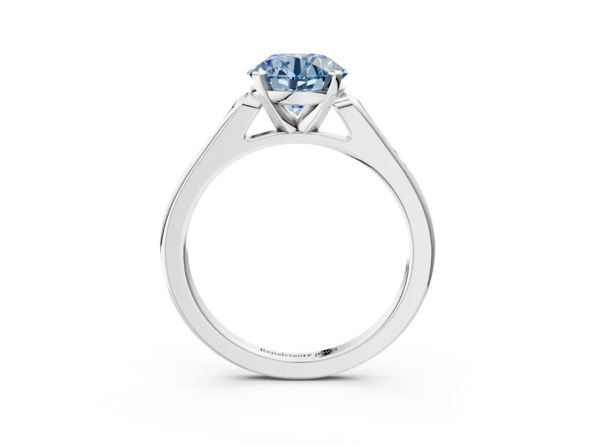 Fancy Blue Round Cut Diamond Solitaire Ring with Channel Set Round Band and Prong Setting Silver