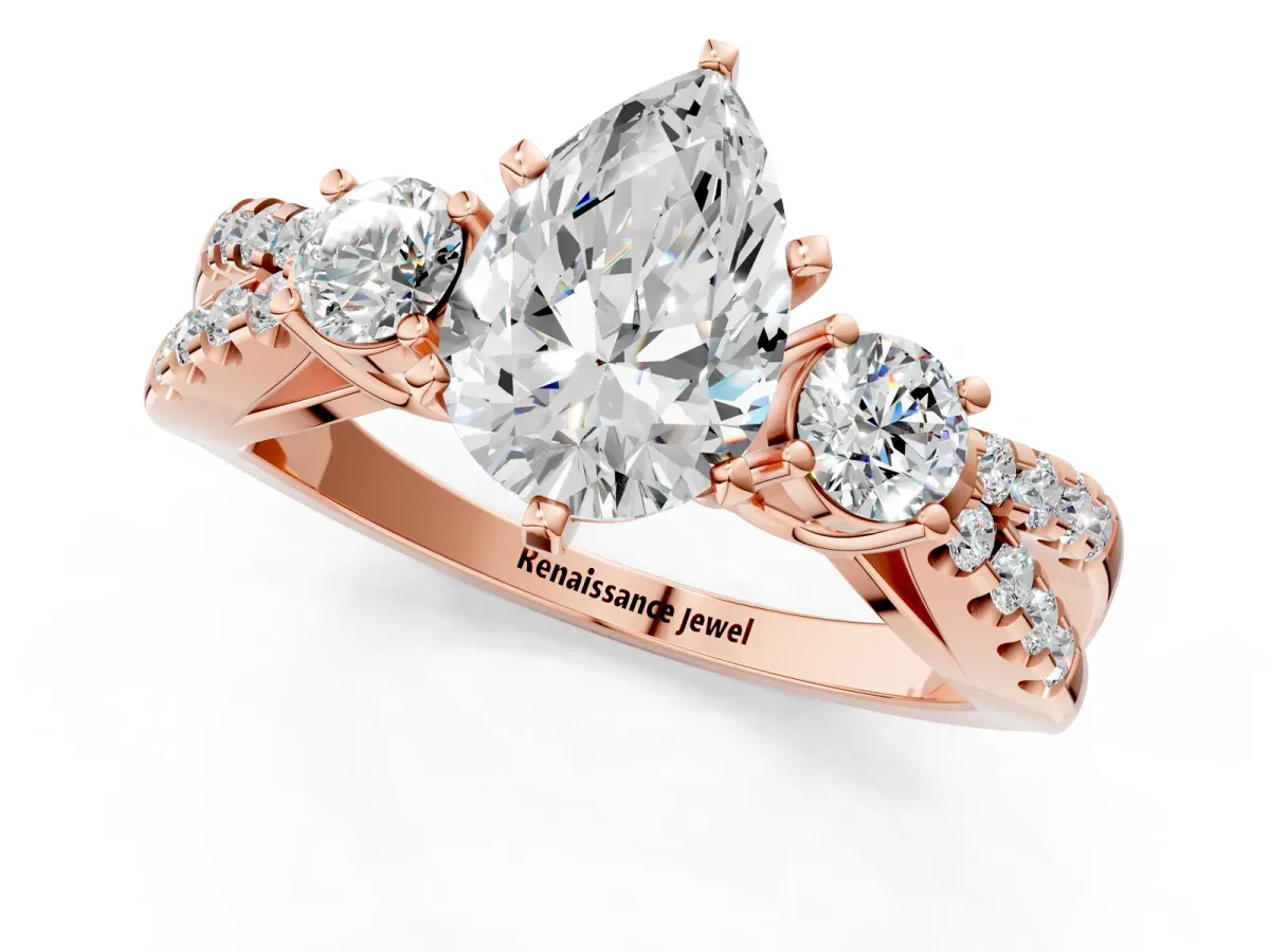 Pear Cut Diamond Three-Stone Ring with Pavé Split Shank and Four-Prong Setting Rose gold