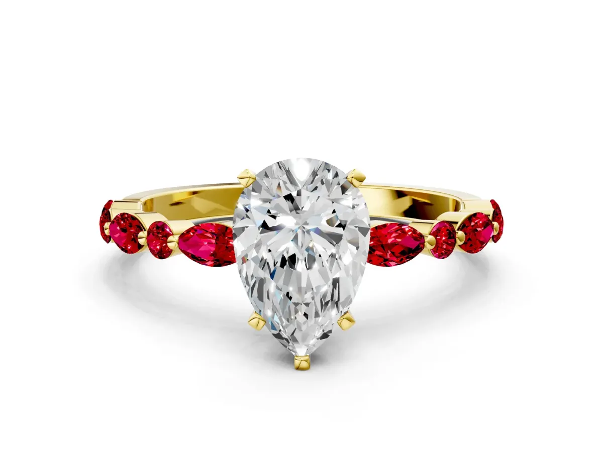 Pear Cut Diamond Ring with Marquise and Round Ruby Side Stones and Four-Prong Setting Yellow gold