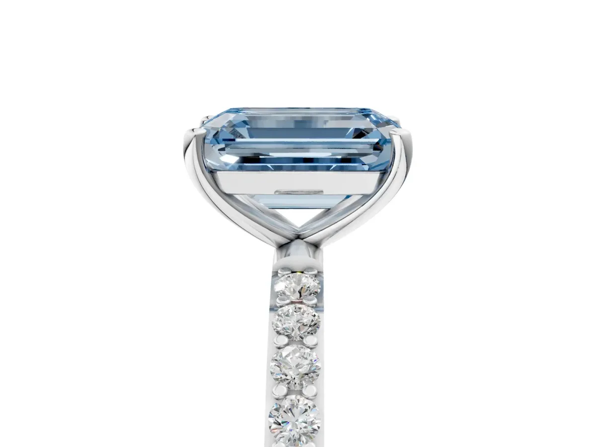 Fancy Blue Emerald Cut Diamond Solitaire Ring with Round Pavé Shoulders and Prong Setting Silver