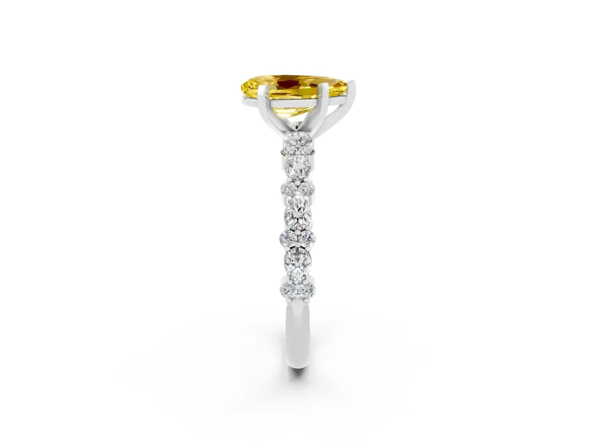 Pear Cut Yellow Sapphire Side Stone Solitaire Ring with Round and Four-Prong Setting Silver