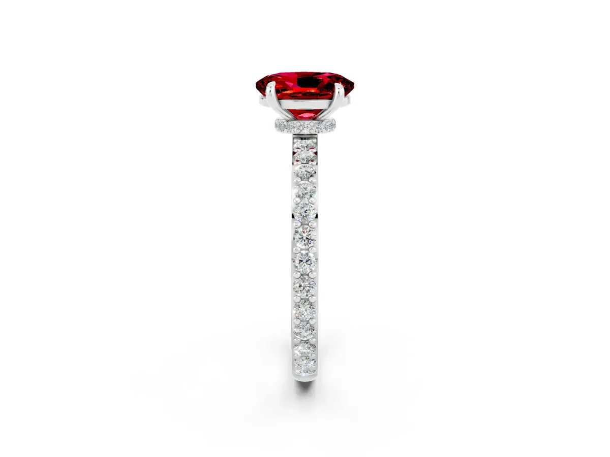 Oval Cut Ruby Solitaire Engagement Ring with Pavé Band and Four-Prong Setting Silver