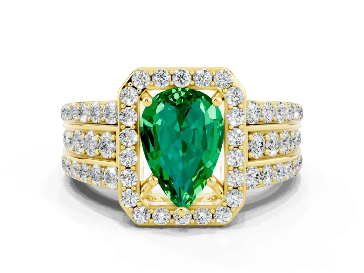 Pear Cut Halo Emerald Ring with Round Split Shank and Prong Setting Yellow gold