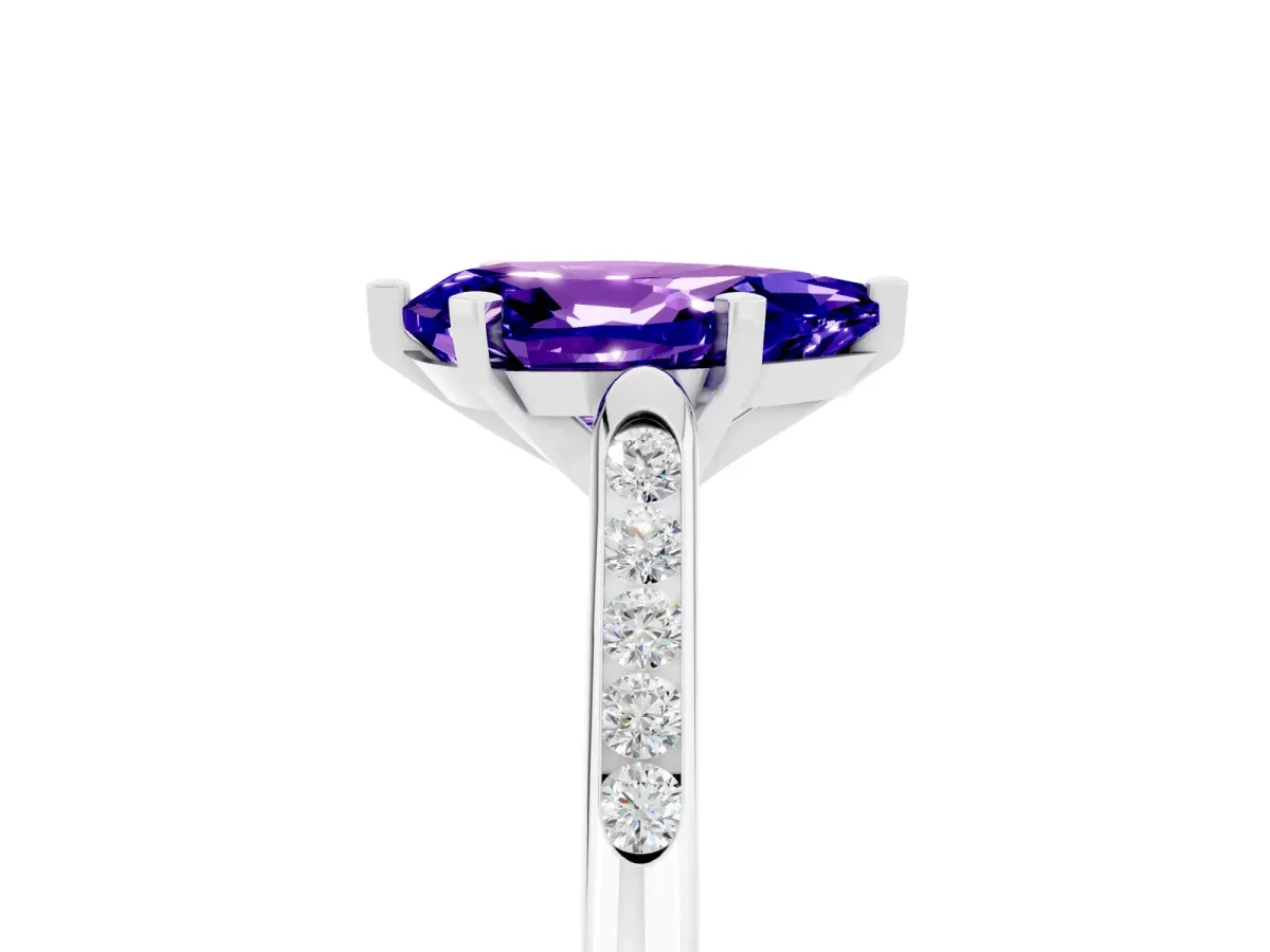 Pear Cut Tanzanite Solitaire Ring with Channel Set Round Band and Prong Setting Silver