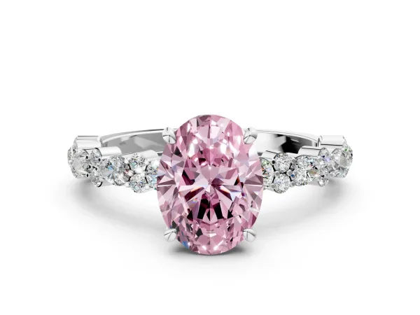 Fancy Pink Oval Cut Diamond Side Stone Solitaire Ring with Round and Four-Prong Setting White gold